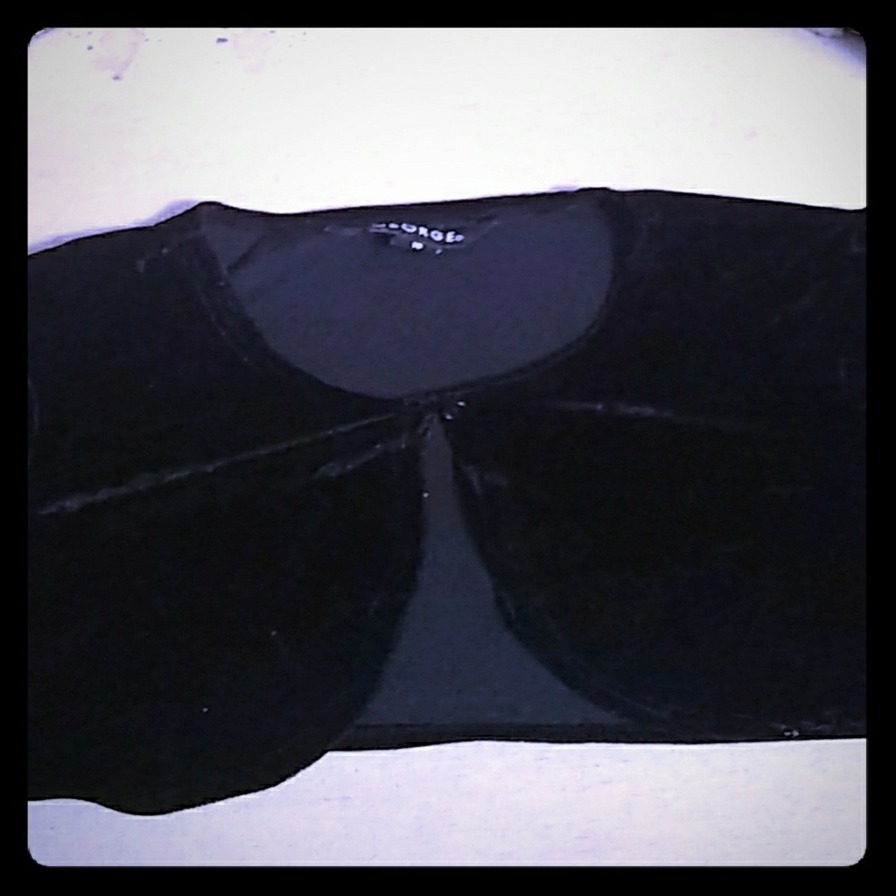 Black “mini-coat,"sweater/vest